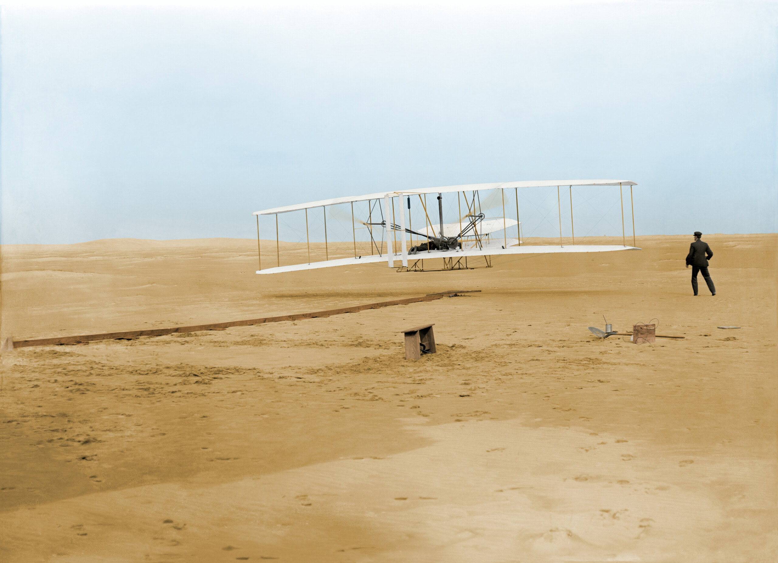 Colourised image of the Wright Brothers' first flight